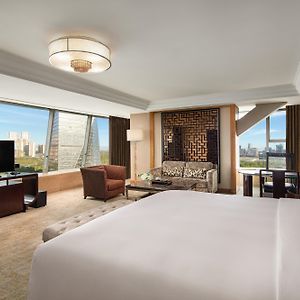 1 King Bed Premier Suite Living Dining Area